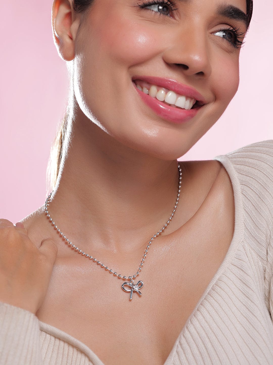 rhodium-plated-silver-beaded-chain-necklace-with-minimalist-bow-pendant-n (1)
