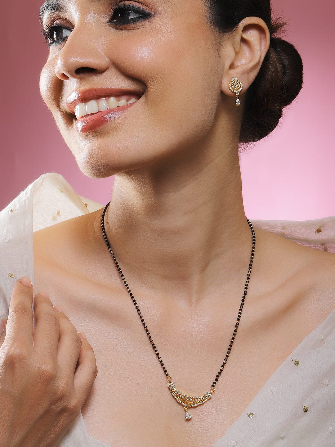 rubans-18k-gold-plated-white-cubic-zirconia-studded-curved-bar-mangalsutr (1)