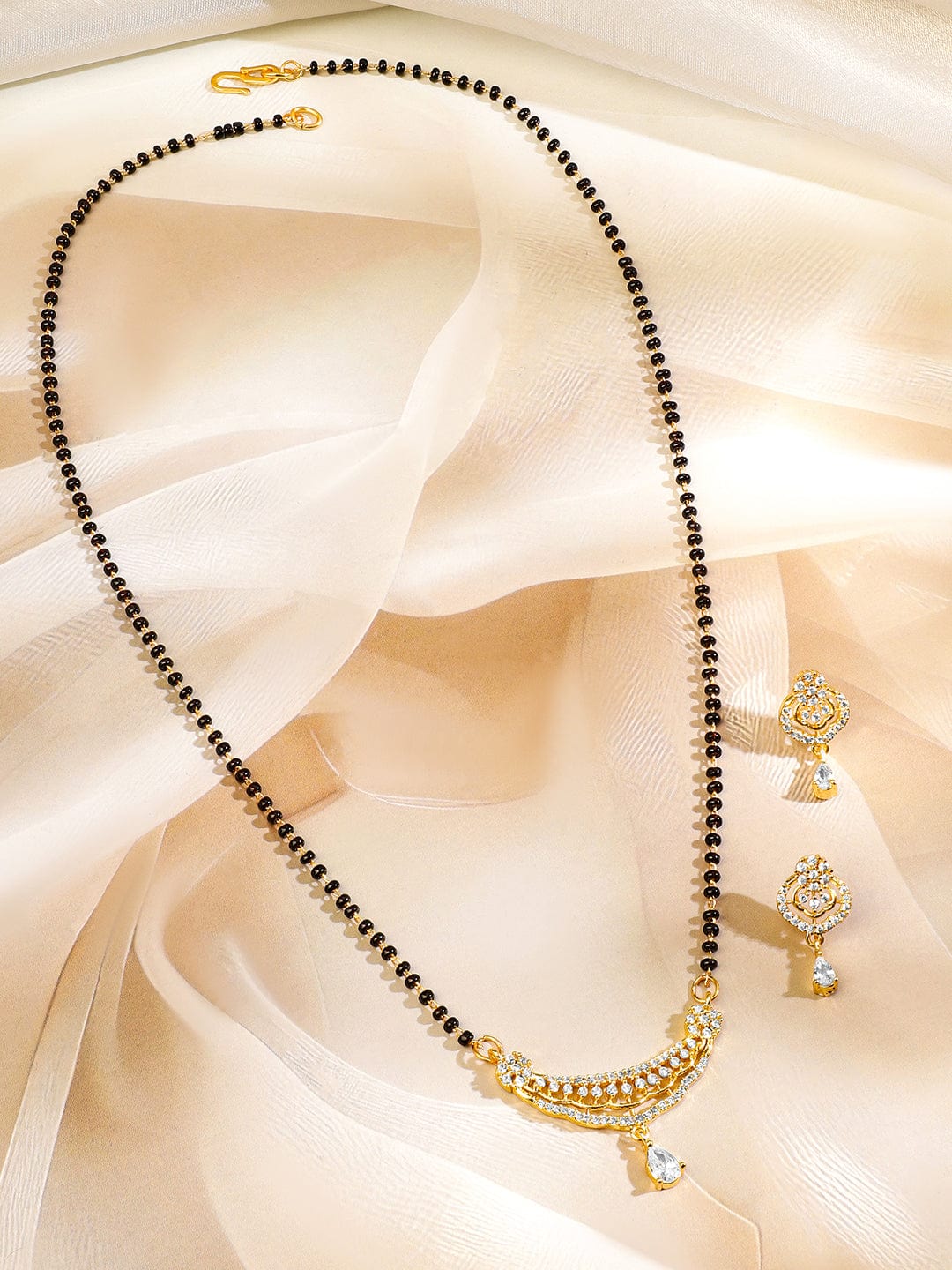 rubans-18k-gold-plated-white-cubic-zirconia-studded-curved-bar-mangalsutr (2)